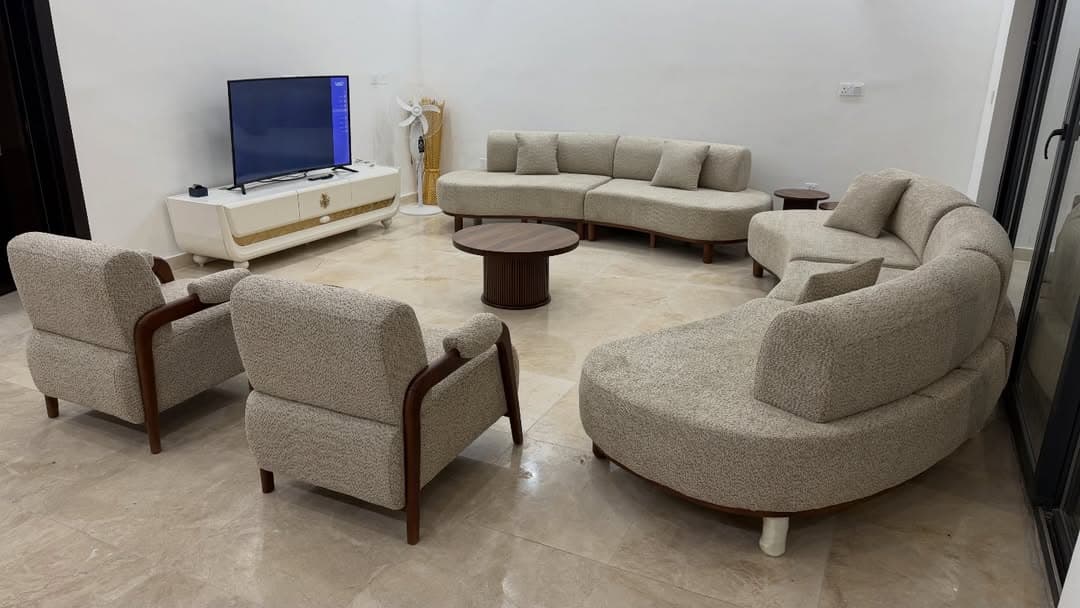 Handcrafted curved boucle sectional sofa from the Ever Ready workshop